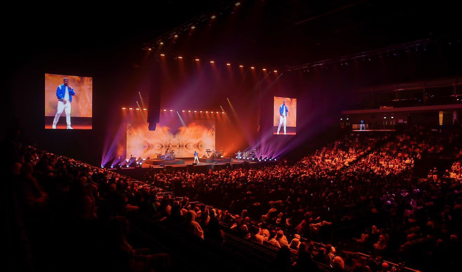 Packed arena audience during the show